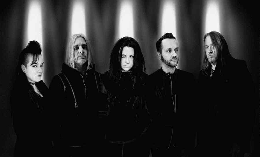 A imagem pode conter Amy Lee Clothing Apparel Pessoa humana Jaqueta Jaqueta Tim McCord Sobretudo e jaqueta de couro